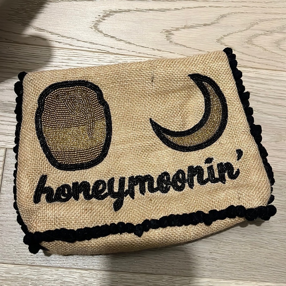 Island to east side sequin honeymoon pouch